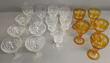 Set of 5 amber glass wine glasses with etched vine leaf decoration, 5 champagne glasses with