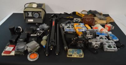 Selection of cameras and camera accessories including Halinamat slide projector, tripods, flashes,
