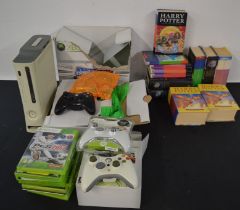 Xbox 360 including 3 controllers, a headset, and games, as well as 12 Harry Potter books