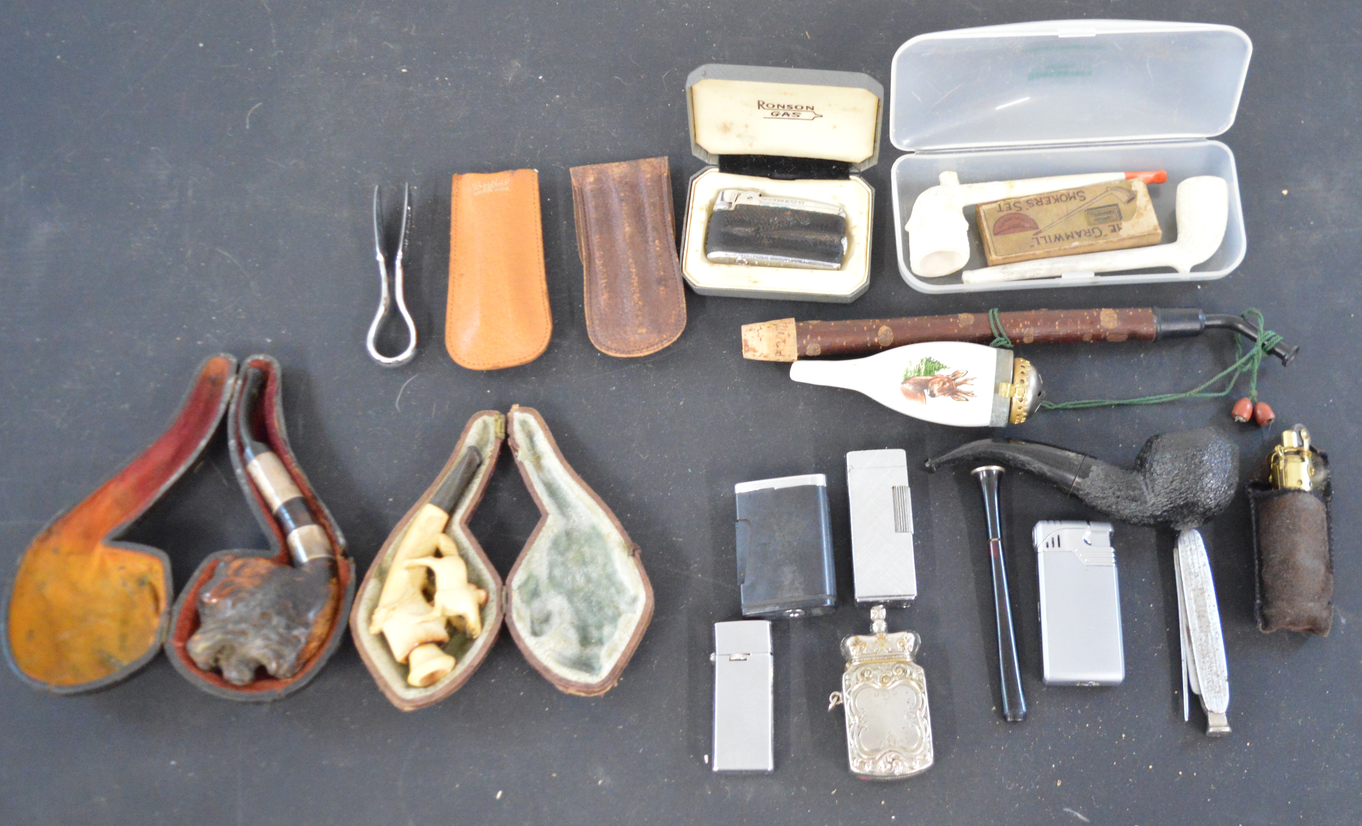 Selection of lighters and pipes including clay & meerschaum