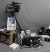 Assorted cameras, video cameras, including Olympus VX-301 - E Video camera with camera bag and