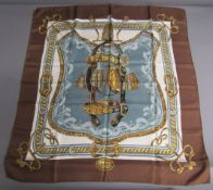 Hermes Bride de Cour silk scarf depicting horse bridle in brown and blue colourway, designed by