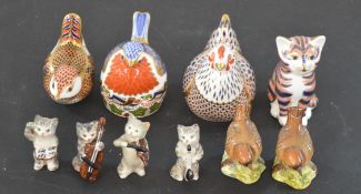 Royal Crown Derby birds and cat paperweights, 2 with silver stoppers, as well as Beswick cat band