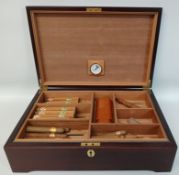 Table top humidor (46cm x 31cm x 13cm) complete with a selection of cigars, leather cigar holder and