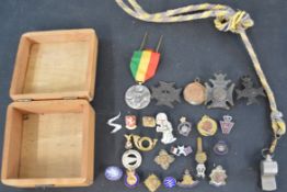 Wooden box of medals and military pins