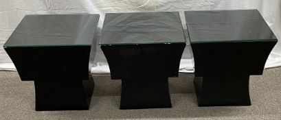 Set of three low level drinks tables with glass tops