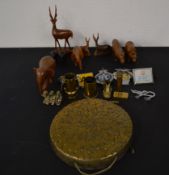 Selection of brass ware, wooden animals and car badges. Includes a gong, AA badges, monkey