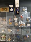 Selection of militaria, commemorative badges and medals including British World War 1 victory
