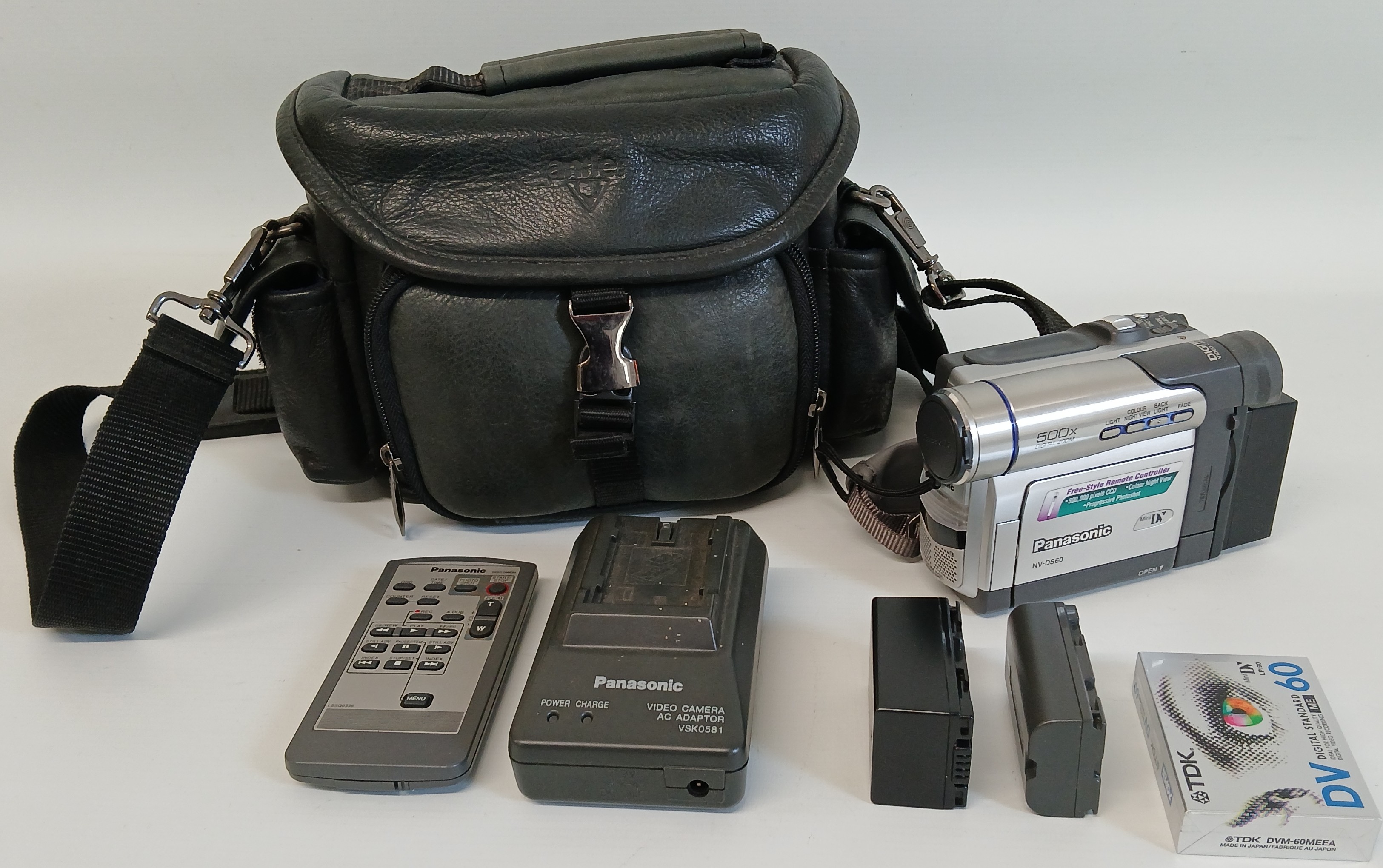 Panasonic digital video camera with spare cassette, remote control, spare batteries, carrying case &