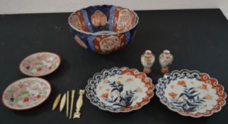 Large Japanese bowl (repaired with rivets), Japanese Imari plates and small vases, and bone sewing