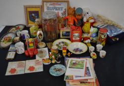 Large selection of Rupert the Bear collectables including figures, jumpers, postcards, toys,