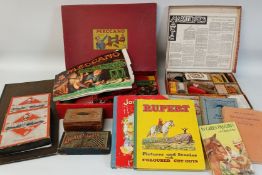 Vintage games and children's books including Maskelyne's Mysteries magic set by Gamages, Meccano