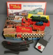 Triang Scalextric set, Triang OO gauge Freightmaster train set and additional rail, carriages and