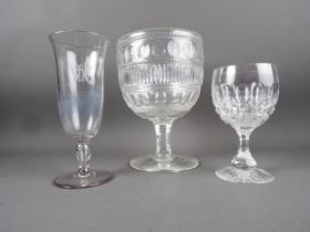 A 19th century celery vase with hollow stem and monogrammed decoration, 9" high, a cut glass