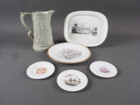 A green glazed relief moulded jug, 5 1/2" high (cracked), a Spode bat printed dish with game bird