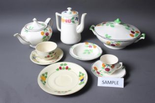 An Adams Royal Ivory Titian ware part teaset and a Barkers Bros Ltd cherry fruit tree pattern part