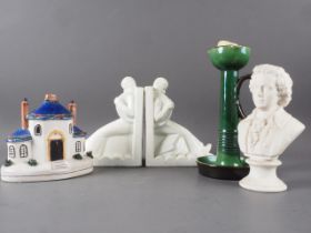 A Brannam pottery green glazed candlestick, 9 1/2" high, a bisque porcelain bust of Beethoven, a