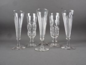 A pair of 19th century Newcastle cut glass ale glasses with knopped stems, 8" high (one chipped) and