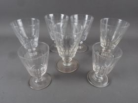 A set of five early 19th century cut glass rummers with bladed and knocked stems, 6 1/4" high, and
