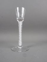 An 18th century cordial glass with double cotton twist stem, an ale glass and two port glasses