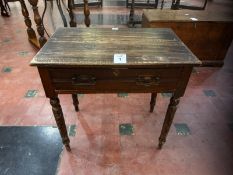 To match Lot 8. An Edwardian mahogany frieze table raised over ring turned legs having single drawer