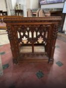 A 19th century Gothic Revival carved oak prie-dieu or prayer desk.