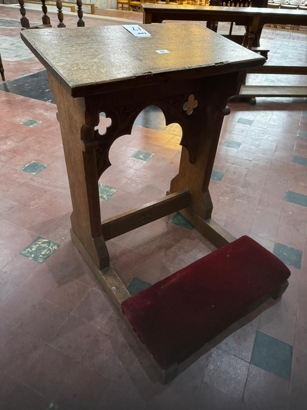 A late 19th century oak prie-dieu or prayer desk in the Gothic style with pierced quatrefoils,