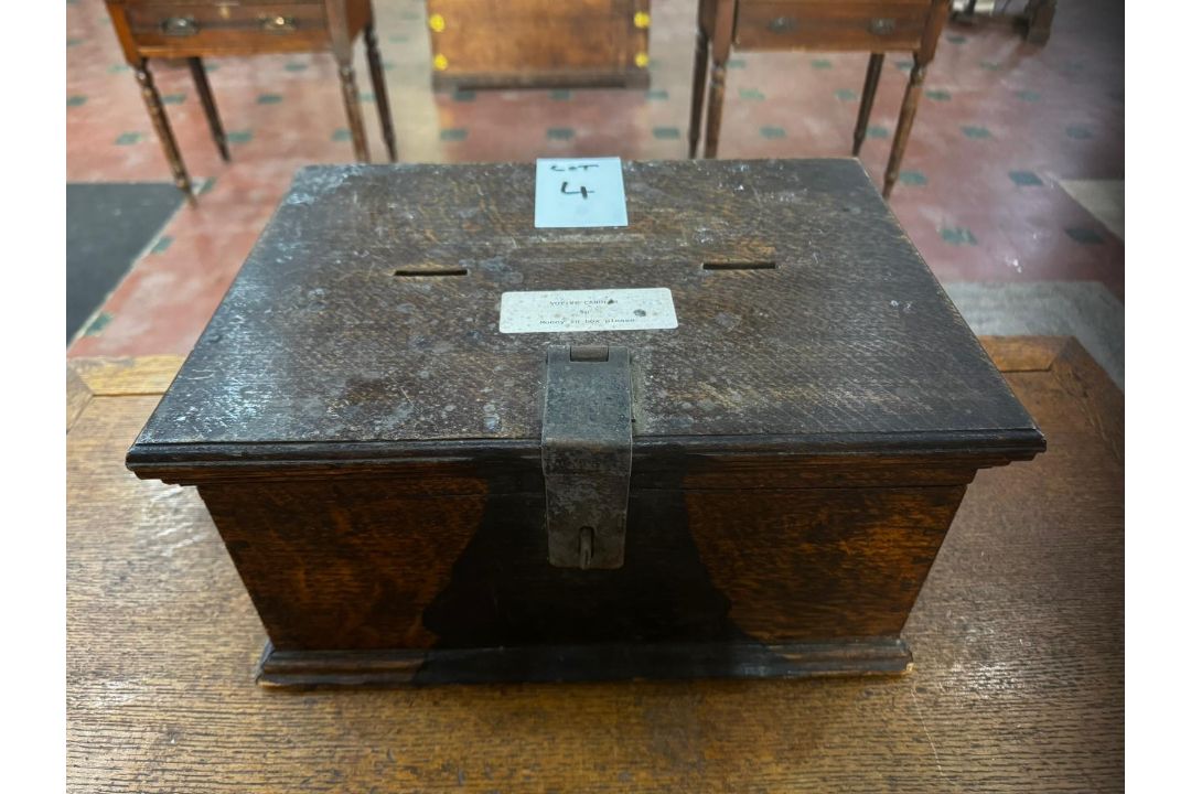 A 19th century lidded oak hinged-top box previously used as a votive candle payment repository, - Image 1 of 6