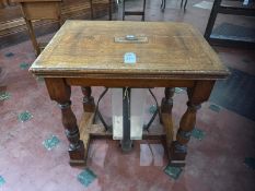 A stout oak 19th century square shaped collection table with raised centre slot and collection
