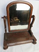 A dressing table mirror with jewellery drawer under.