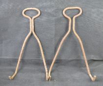 A pair of antique wrought iron beehive l