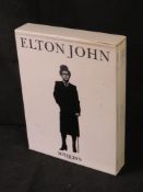 A boxed set of Sotherby's Catalogues for the Elton John sale.
