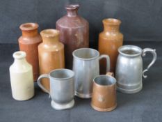 A quantity of stoneware bottles together