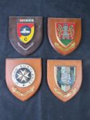 Four regiment plaques.