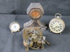 Three small mantle / travel clocks and one movement.