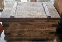 A pine carpenters tool chest with slides and compartments within.