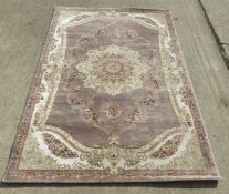 A woollen rug 160 x 230cm.