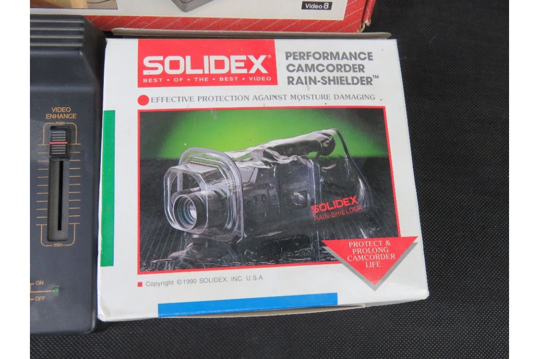A Hama Combi charger, a CamLink video processor and a camcorder rain-shield, each in box. - Image 3 of 3