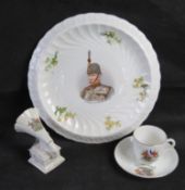 A military themed plate bearing portrait