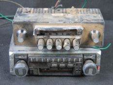 Two vintage car steroes. Disclaimer: electrical items are sold as untested and without guarantee.