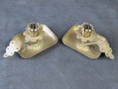 A pair of German brass chamber sticks.