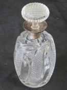 A superb cut glass and hallmarked silver decanter, London 1903.