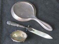 A hallmarked silver hand mirror,