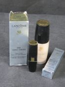 Two Lancome makeup items in original packaging.