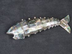 An abalone shell articulated fish.