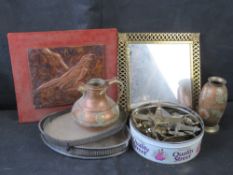 A quantity of metal wares including brass framed mirror, silver plated tray etc.