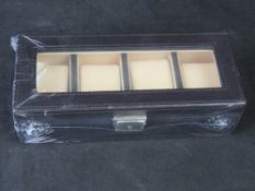 An as new watch storage box.
