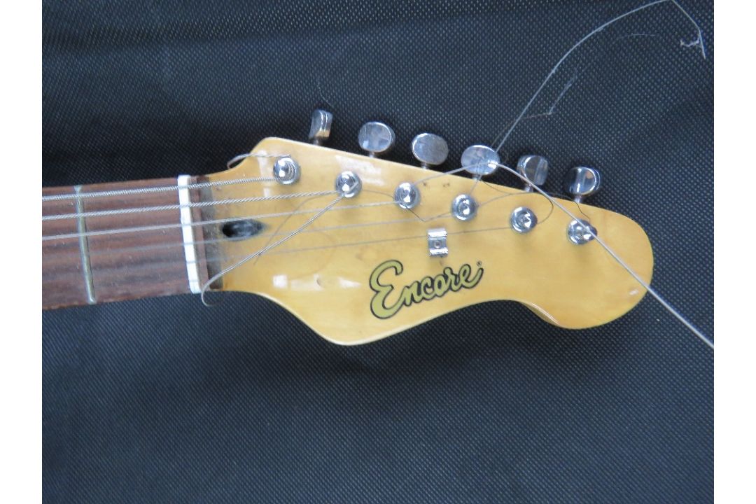 An Encore guitar. Disclaimer: electrical items are sold as untested and without guarantee. - Image 2 of 4