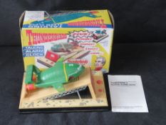 A Thunderbirds alarm clock in original box.