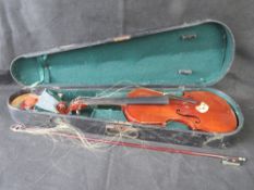 A vintage violin with bow, a/f, label wi